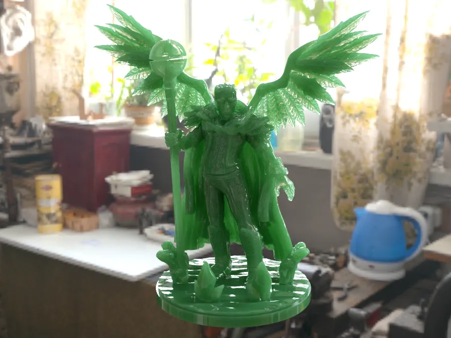 A photorealistic preview of a table-top gaming figurine which is 3D printed in a green UV resin mixed from CMYKW and additional clear resin.